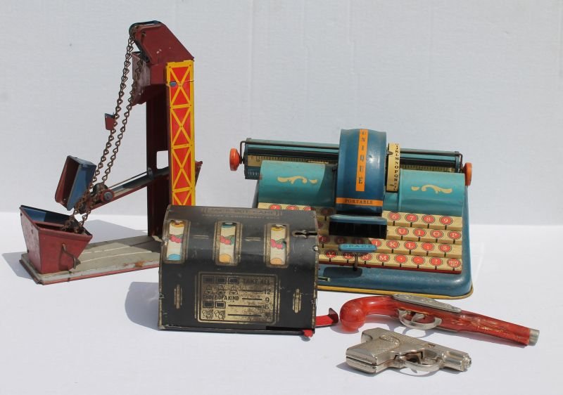 ecclectic antique toy lot incl 2 cap guns - 1 by (1 of 2)