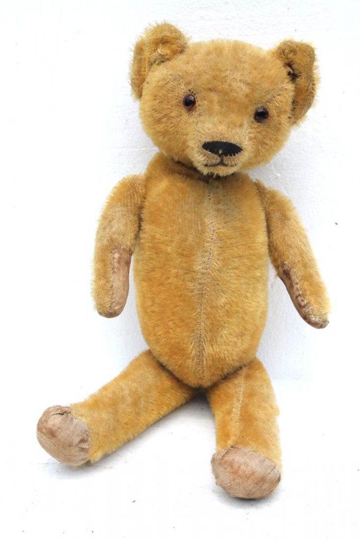 very early 20thC jointed mohair teddy bear w glass eyes (1 of 2)