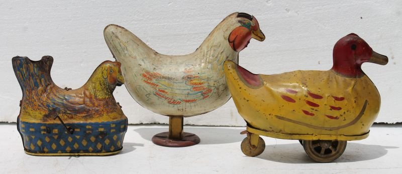 3 antique metal toys incl 2 egg laying tin chickens by (1 of 8)