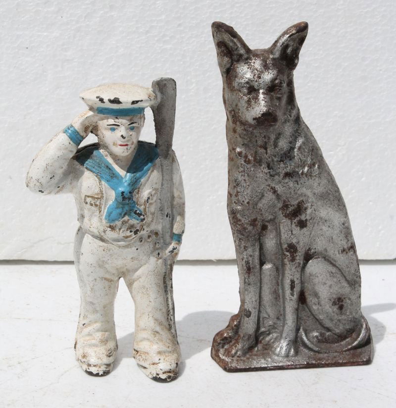 lot of 2 cast iron items - a 5 1/2" sailor bank & 6 (1 of 3)