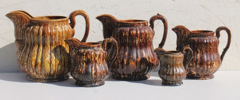5 graduated Bennington/Rockingham pitchers from 5 1/4" (1 of 4)
