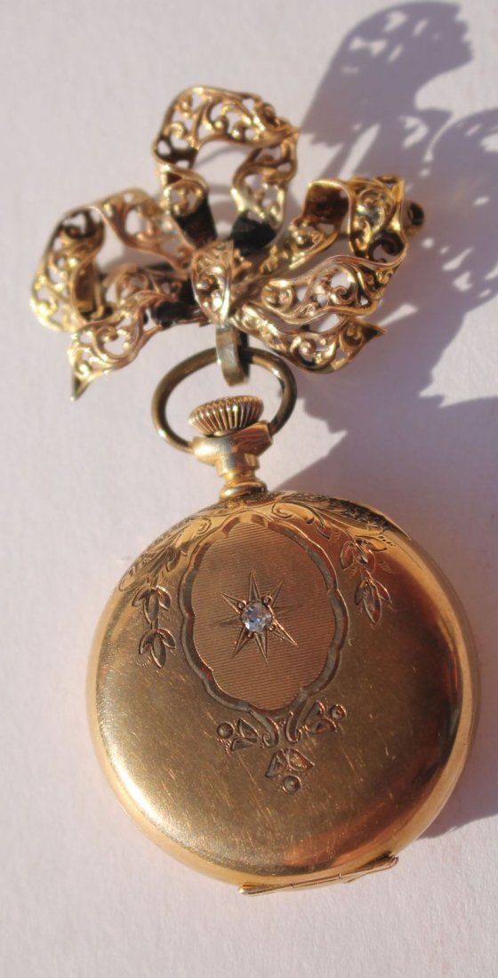 Lady's 14k gold Waltham lapel watch in fitted box (1 of 2)