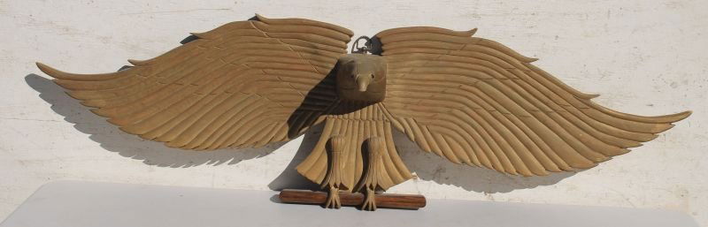 early 20thC carved wooden spread wing eagle w glass (1 of 3)