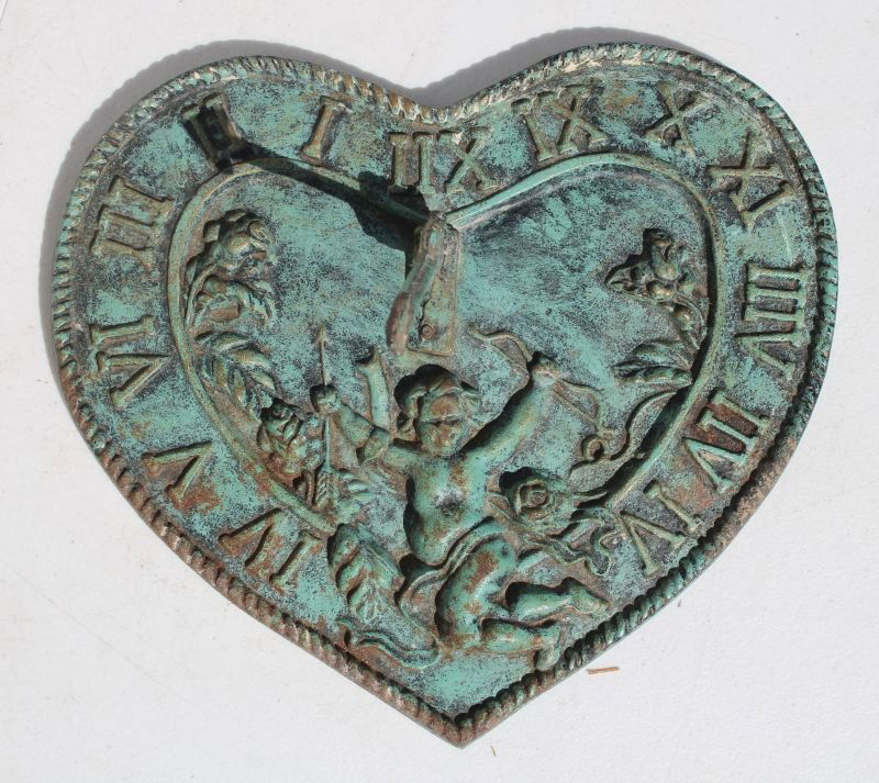 heart shaped cast iron sun dial w cupid & floral relief (1 of 3)