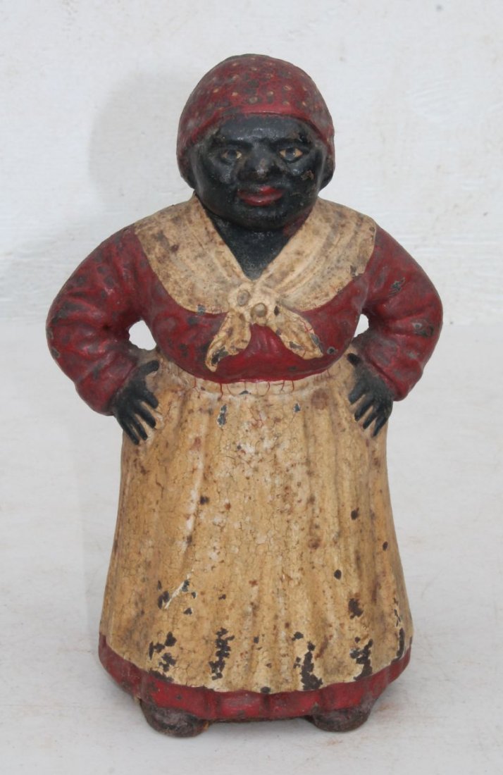 ca 1920 cast iron "Southern Mammy with Hands on Hips": ca 1920 cast iron "Southern Mammy with Hands on Hips" doorstop from Hubley Foundry Lancaster, PA in orig paint & fine patina - 10" tall
