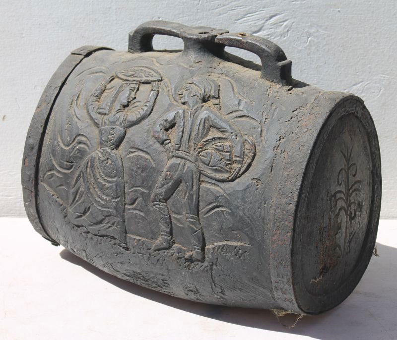 Ancient Continental carved wooden iron bound cask w: Ancient Continental carved wooden iron bound cask w figural/scenic carved dec - from the count of Salis Estate - 16" long x 13" tall