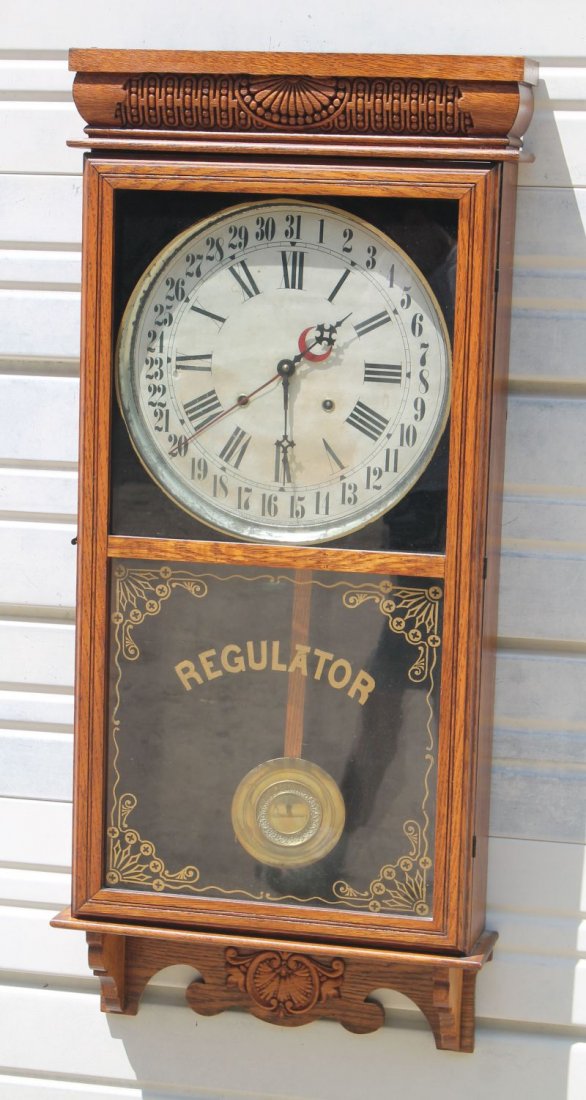 antique Ingraham carved oak calendar regulator clock - (1 of 5)