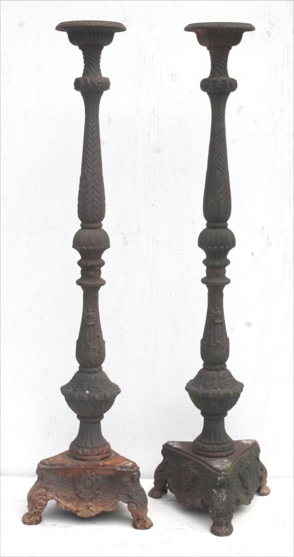 pr of antique cast iron floor standing candlesticks - (1 of 2)