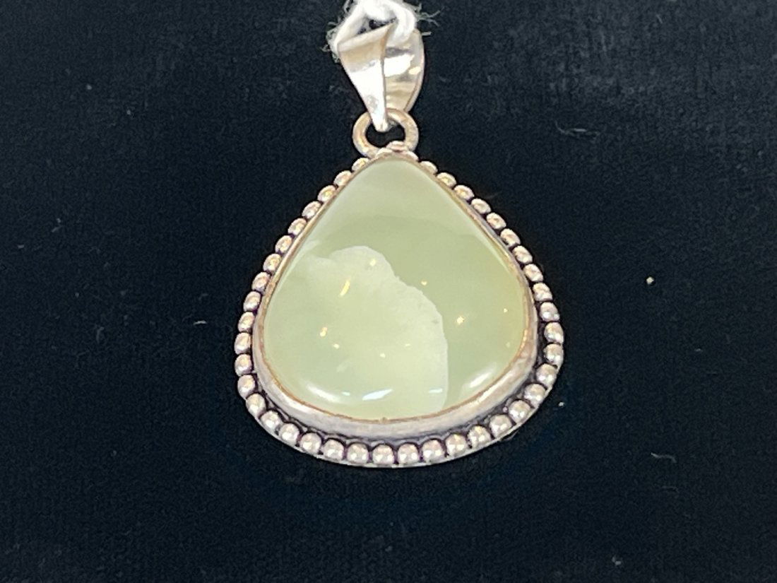 Moonstone Cabochon Pendant: Moonstone cabochon pendant.