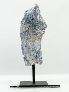 Kyanite Specimen on Stand: Fine Brazilian kyanite specimen on metal stand. 11.75" x 4" x 4". 5.6 pounds.