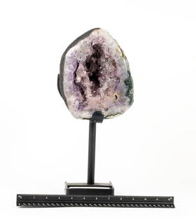 Amethyst Geode on Tall Stand: Amethyst geode on tall black metal stand. 14" x 6" x 6". 11.3 pounds.