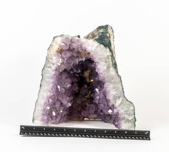 Wizard's Hat Amethyst Cathedral Geode: Amethyst cathedral geode with calcite deposits in the shape of a wizard's hat. 12" x 11" x 7". 25.4 pounds.