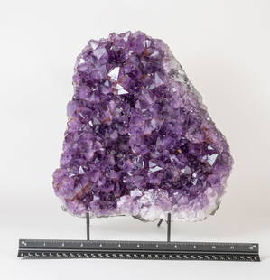 Exceptional Quality Amethyst Crystal Cluster with Hematite Shading: Nineteen pound, exceptional quality amethyst cluster with large, deep-purple crystals and some hematite shading. 12" x 10" x 3".