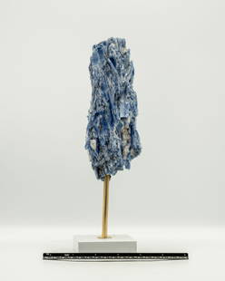 Kyanite Specimen on Stand: Fine Brazilian kyanite specimen on metal stand. 10.75" x 2.75" x 2.75". 2.7 pounds.