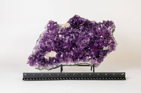 Exceptional Quality Amethyst Cluster With Fluorescent Calcite Deposits: Exceptional quality amethyst cluster with dark deep-purple crystals and fluorescent calcite deposits. 7.5" x 11" x 3.5". 8.11 pounds.