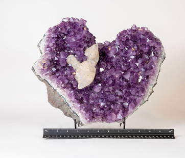 Exceptional Quality Heart-Shaped Amethyst Crystal Cluster with Calcite Deposits: Exceptional heart-shaped quality amethyst cluster with dark, deep-purple crystals and fluorescent calcite deposits. 11" x 13.5" x 5". 18.15 pounds.