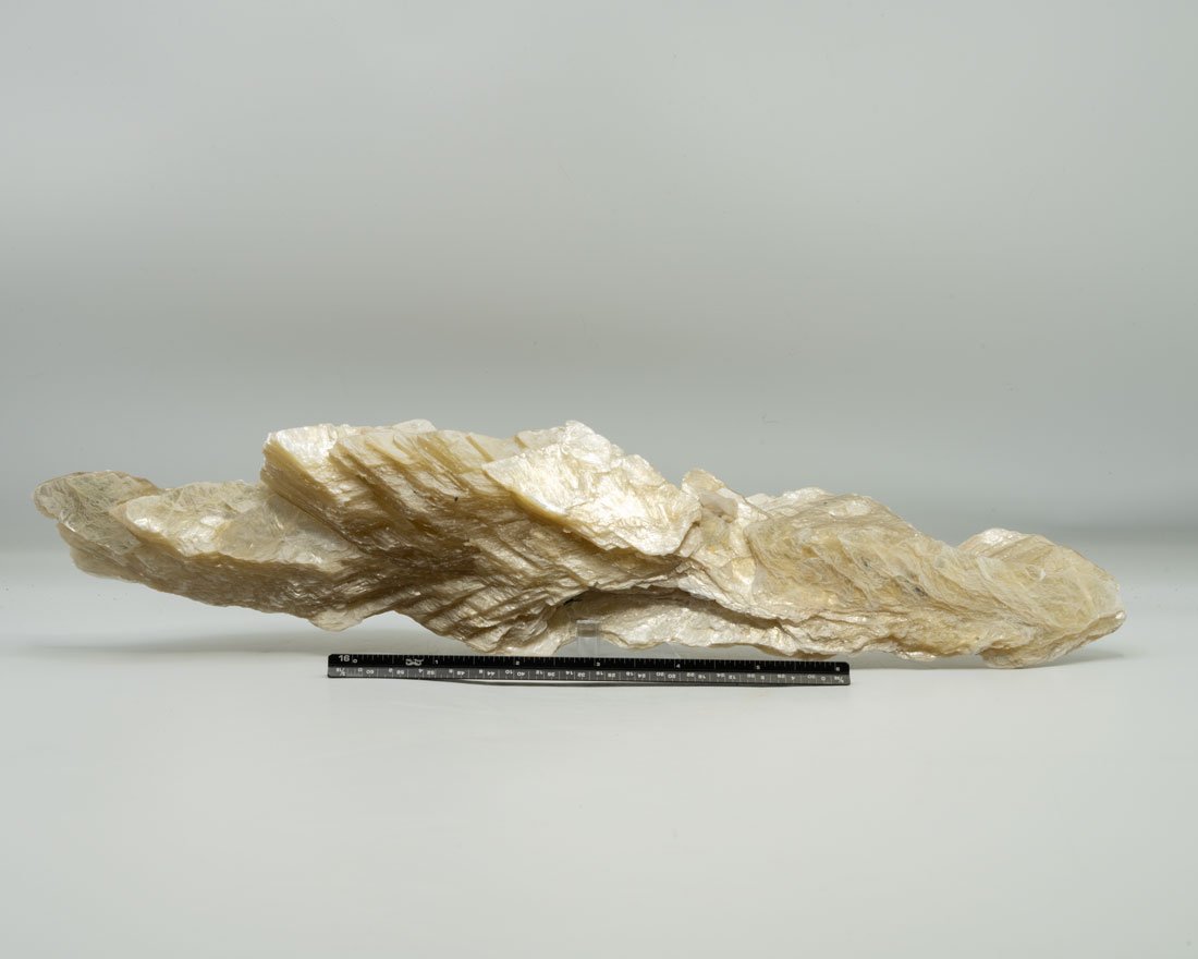 Golden Muscovite Mica Specimen: Golden muscovite mica specimen. 3.25 x 14 x 2.5 inches. 2.7 pounds.