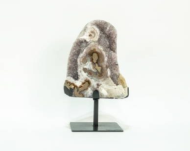 Amethyst Stalactite Cluster on Metal Stand: Amethyst cluster with stalactites on black metal stand. 10.5" x 6.25" x 4.5". 8.15 pounds.