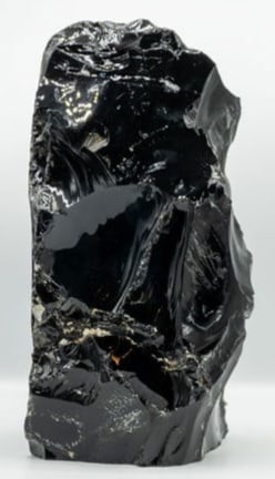 Polished Black Obsidian Freeform: Black, polished and sharp obsidian freeform from Jalisco, Mexico. 9.75” x 5” x 4”. 9 pounds.