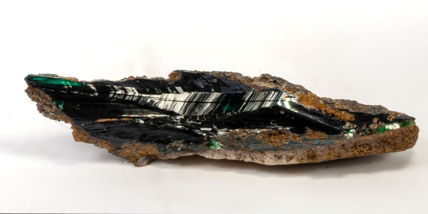 Rare Vivianite Crystal Cluster: Rare, high quality, translucent, green vivianite crystals in matrix. 8" x 2" x 3". 458 grams.