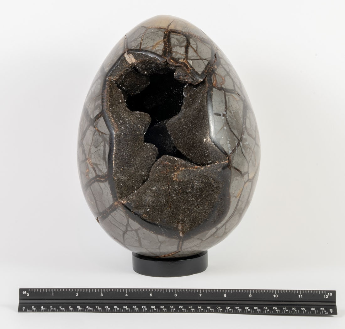 Huge Septarian Dragon Egg Geode: Huge septarian dragon egg geode from Madagascar. 11" x 8" x 8". 29 pounds, 6 ounces.