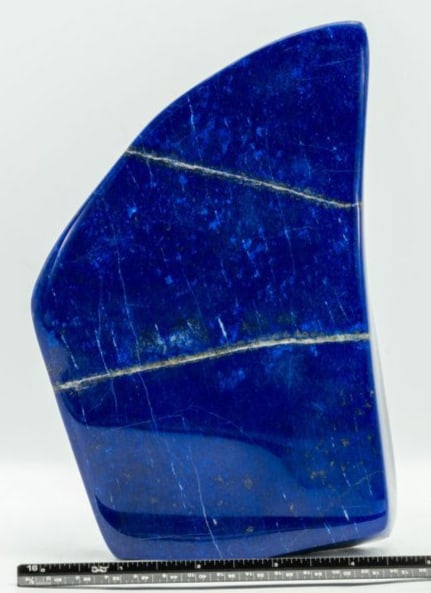 Polished High Grade Lapis Lazuli Slab: Polished high grade lapis lazuli slab. 7.5" x 5.25" x 1.5". 4 pounds, 1 ounce.