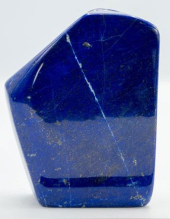 Polished High Grade Lapis Lazuli Slab: Polished high grade lapis lazuli slab. 4.75" x 3.25" x 1". 1 pound, 13 ounces.