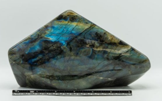 Polished Labradorite Freeform: Polished labradorite freeform from Madagascar. 4.75" x 8.25" x 2.75". 7 pounds.