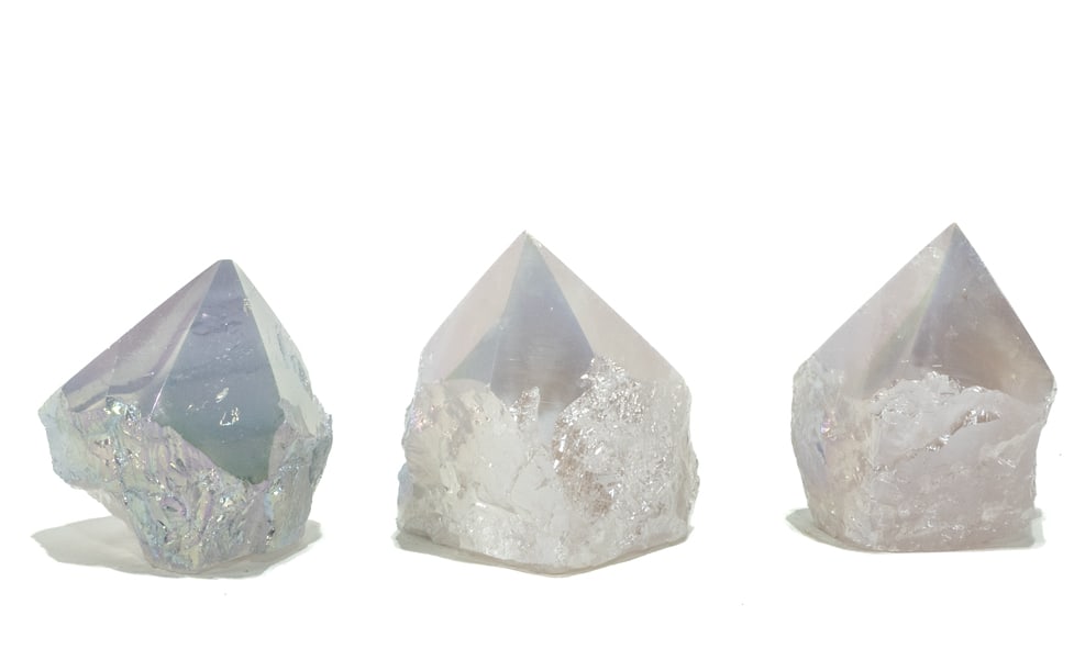 Three Aura Rose Quartz Points: Three aura rose quartz points. Each is approximately 3” x 2.5” x 1.75”. Total weight is 1 pound, 12 ounces.