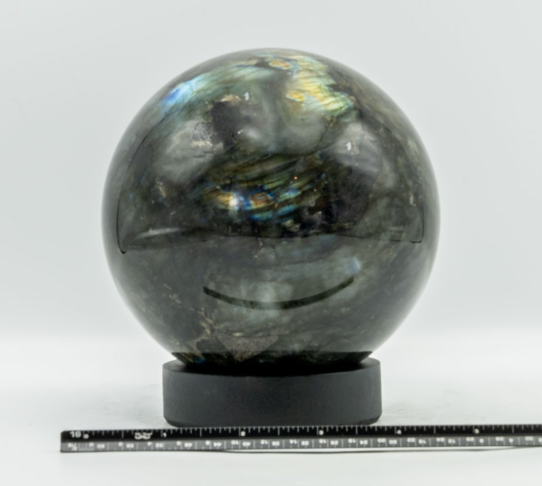 Large Labradorite Sphere: Flashy and large labradorite sphere. 5" x 5" x 5". 5 pounds, 9 ounces.