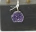 Amethyst Cluster Pendant: Amethyst pendant with silver-colored plating on edges. 1.25" x 1.25" x 0.5". 18 grams.