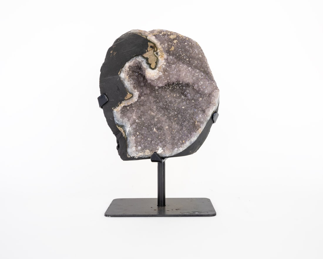Amethyst Cluster on Metal Stand: Amethyst cluster on black metal stand. 10.5" x 5.75" x 5.5". 10 pounds, 12 ounces.