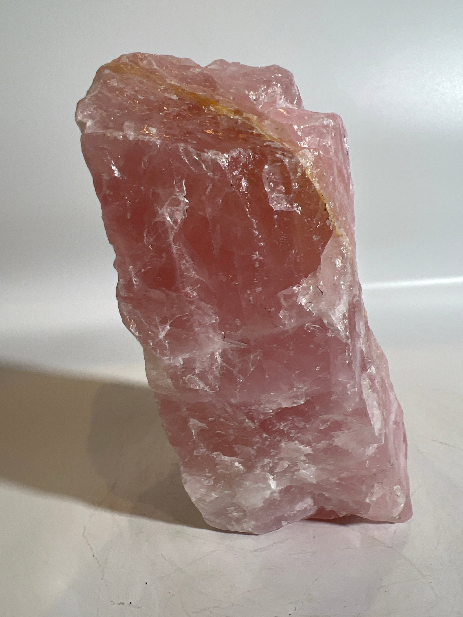 Unpolished Rose Quartz Specimen: Unpolished rose quartz specimen. 6" x 3" x 2.75". 2 pounds, 13 ounces.