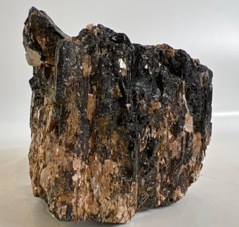 Black Tourmaline and Golden Mica Formation: Black tourmaline and golden mica formation. 4.25" x 4" x 3.5". 2 pounds, 13 ounces.