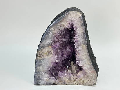 Amethyst Cathedral Geode: Amethyst cathedral geode with secondary quartz and calcite crystals. 10" x 8.5" x 6". 18 pounds, 8 ounces.