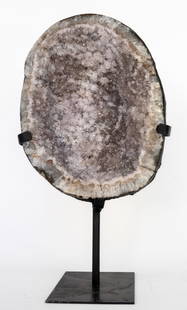 Amethyst Geode on Metal Stand: Amethyst geode on black metal stand. 14" x 7.25" x 5.75". 10 pounds.