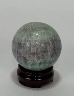 Polished Fluorite Sphere: Polished fluorite sphere. 2.75" x 2.75" x 2.75". 542 grams.