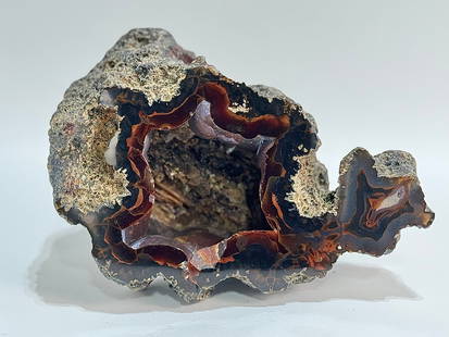 Brown Agate Geode: Brown agate geode. 6.5” x 9” x 5”. 7 pounds, 5 ounces.