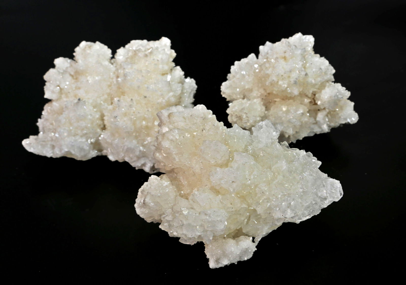 3 Mexican Aragonite Formations: 3 Mexican aragonite/cave calcite formations. 1,048 grams.