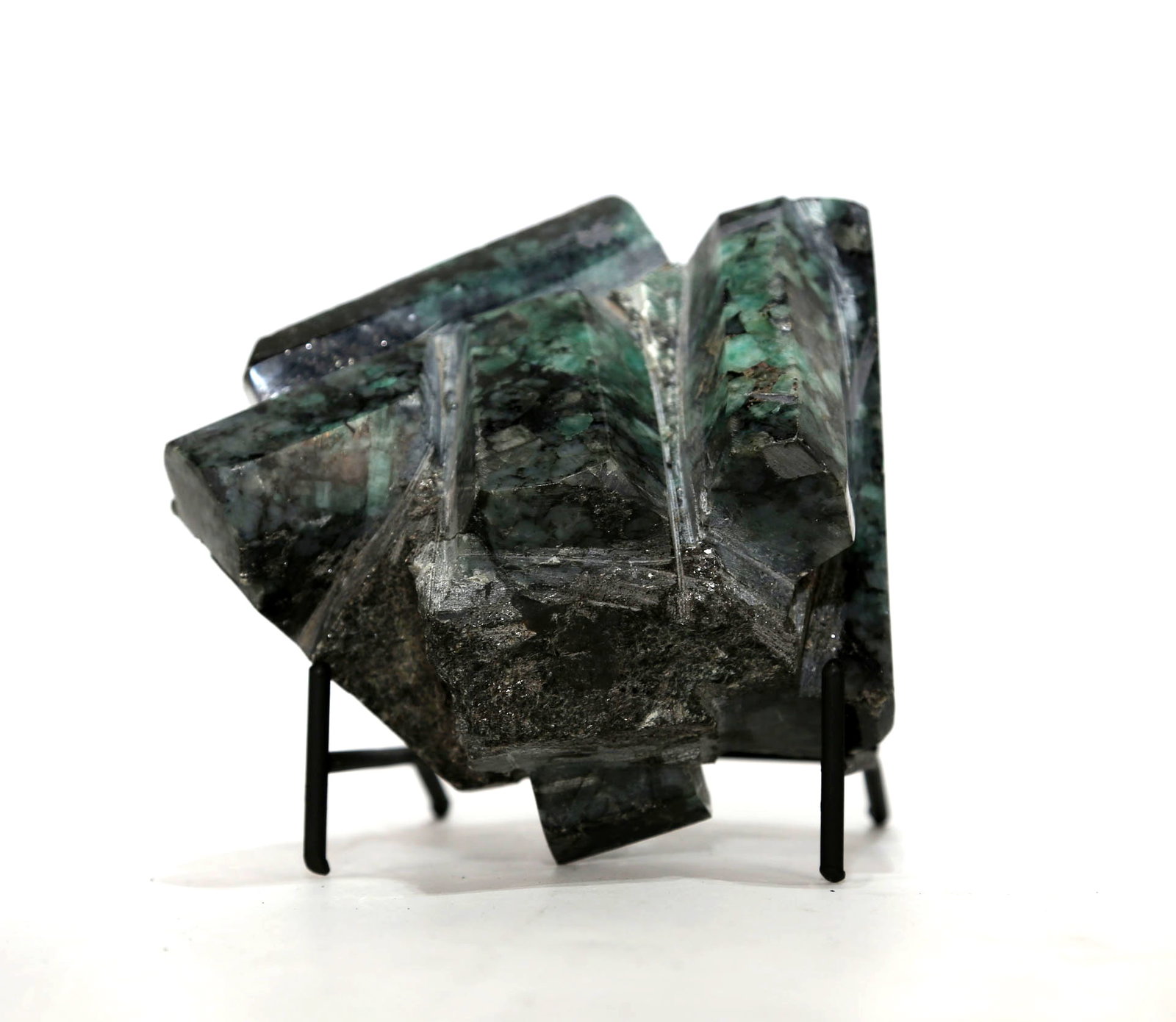 Polished Green Emeralds in Matrix: Polished green emeralds in matrix. 6" x 6" x 4. 4 pounds, 13 ounces.