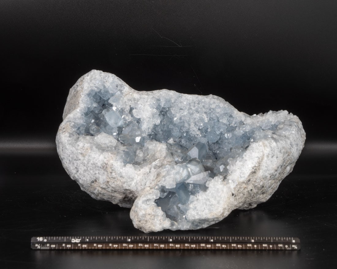 Celestite Geode: Celestite geode from Madagascar. 4.25" x 7" x 6". 6 pounds, 7 ounces.