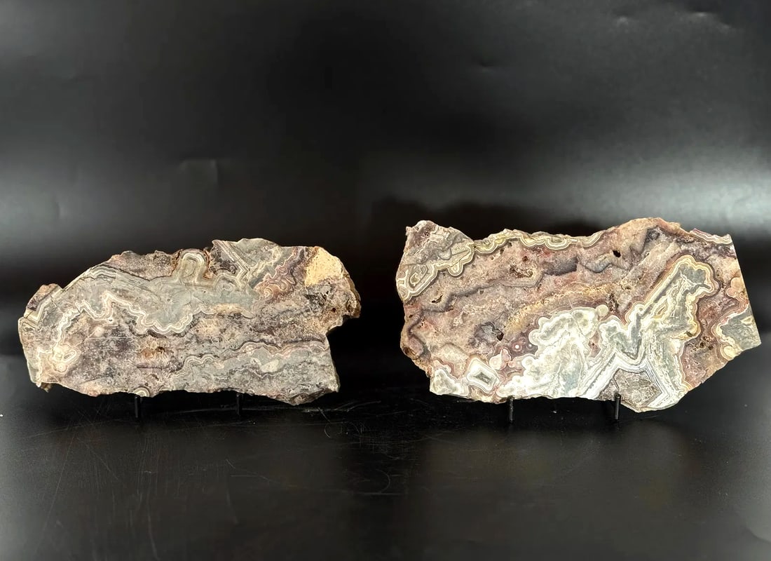 2 Crazy Lace Agate Slices: 2 crazy lace agate slices. Each is approximately 4” x .8” x .25”. 1 pound, 11 ounces.