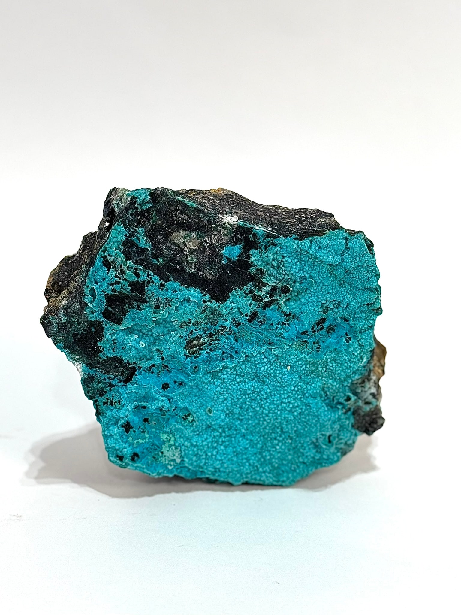 Blue Chrysocolla Specimen: Botryoidal blue chrysocolla specimen from Peru. 6.25" x 6.5" x 3". 5.15 pounds.