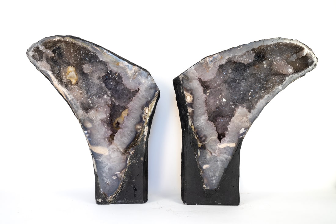 Amethyst Geode Angel Wings: Beautiful, freestanding amethyst geode angel wings with stalactites and calcite crystals. 17.75" x 13.75"W x 5.5" and 17.5" x 14" x5.5", respectively. 79.80 pounds total weight.