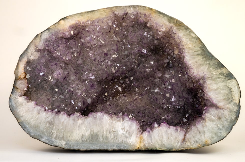 Huge Amethyst Vug Geode With Phantom Crystals: Huge amethyst vug geode with phantom amethyst crystals and goethite inclusions. 15" x 20.5" x 9.5". 72 pounds, 8 ounces.