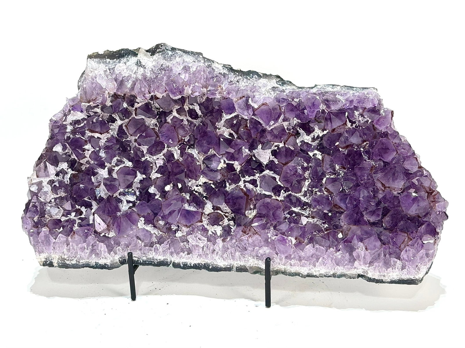 High Grade Amethyst Crystal Cluster: High grade amethyst cluster with calcite from Brazil. 7" x 14" x 3". 12 pounds, 3 ounces.