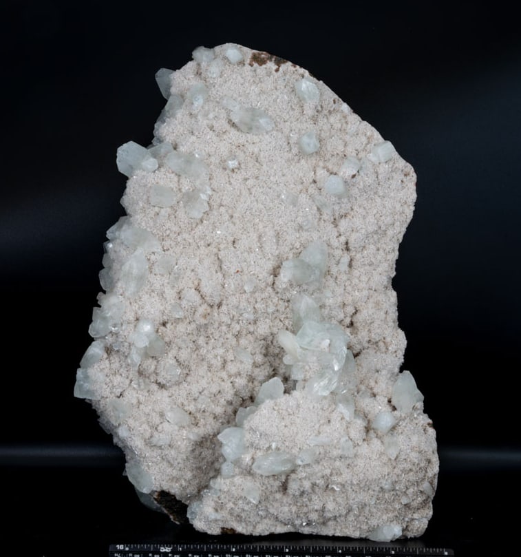 Apophyllite on Pink Heulandite Matrix: Apophyllite on pink heulandite matrix from Maharashtra, India. 10.5" x 7" x 6". 12 pounds, 12 ounces.