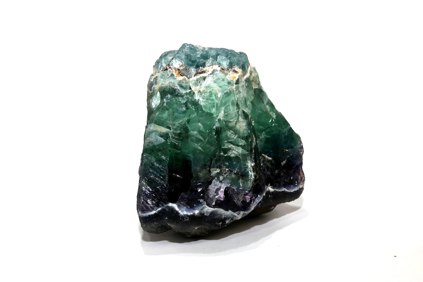 Large Green and Purple Fluorite Formation: Large green and purple fluorite formation from Mexico. 7" x 6" x 5.5". 14 pounds, 8 ounces.