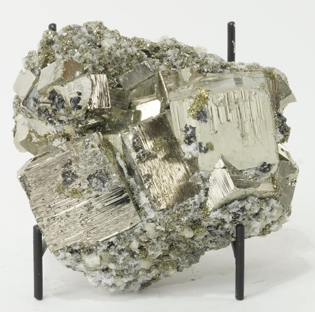 Cubic Pyrite, Sphalerite, Apatite and Fluorescent Calcite Formation: Extraordinary cubic pyrite, sphalerite, apatite and fluorescent calcite formation from the Huanzala Mine in Ancash, Peru. 5" x 6" x 4". 6 pounds, 10 ounces.