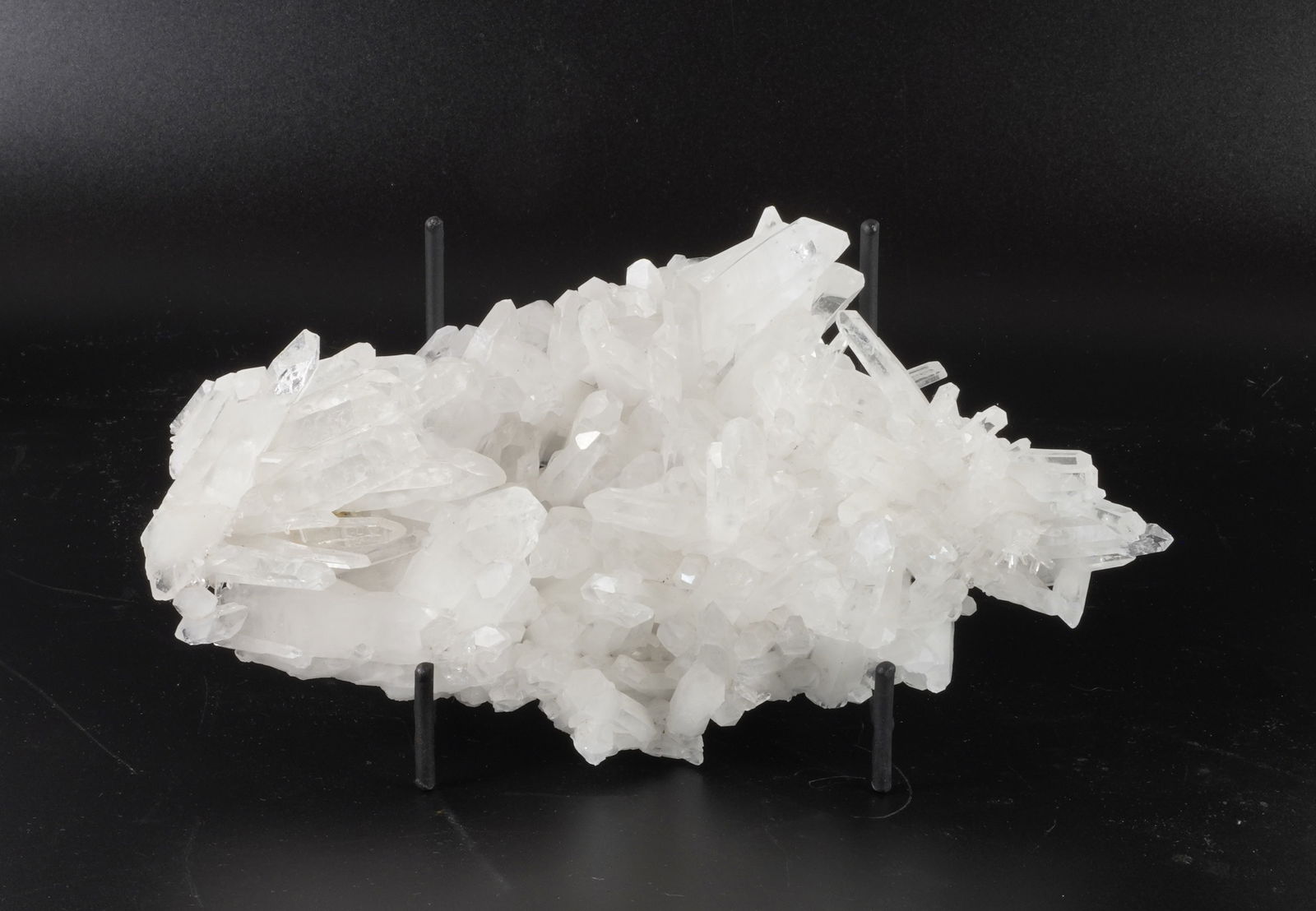 Quartz Crystal Cluster: Highly-crystallized quartz cluster from the Huanzala mine in Peru. 2" x 7.25" x 4". 1 pounds, 2 ounces.